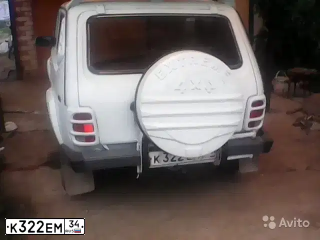 Фото автомобиля LADA 2121 NIVA, 2003 — госномер К322ЕМ34. Цвет: ЯРКО-БЕЛЫЙ
