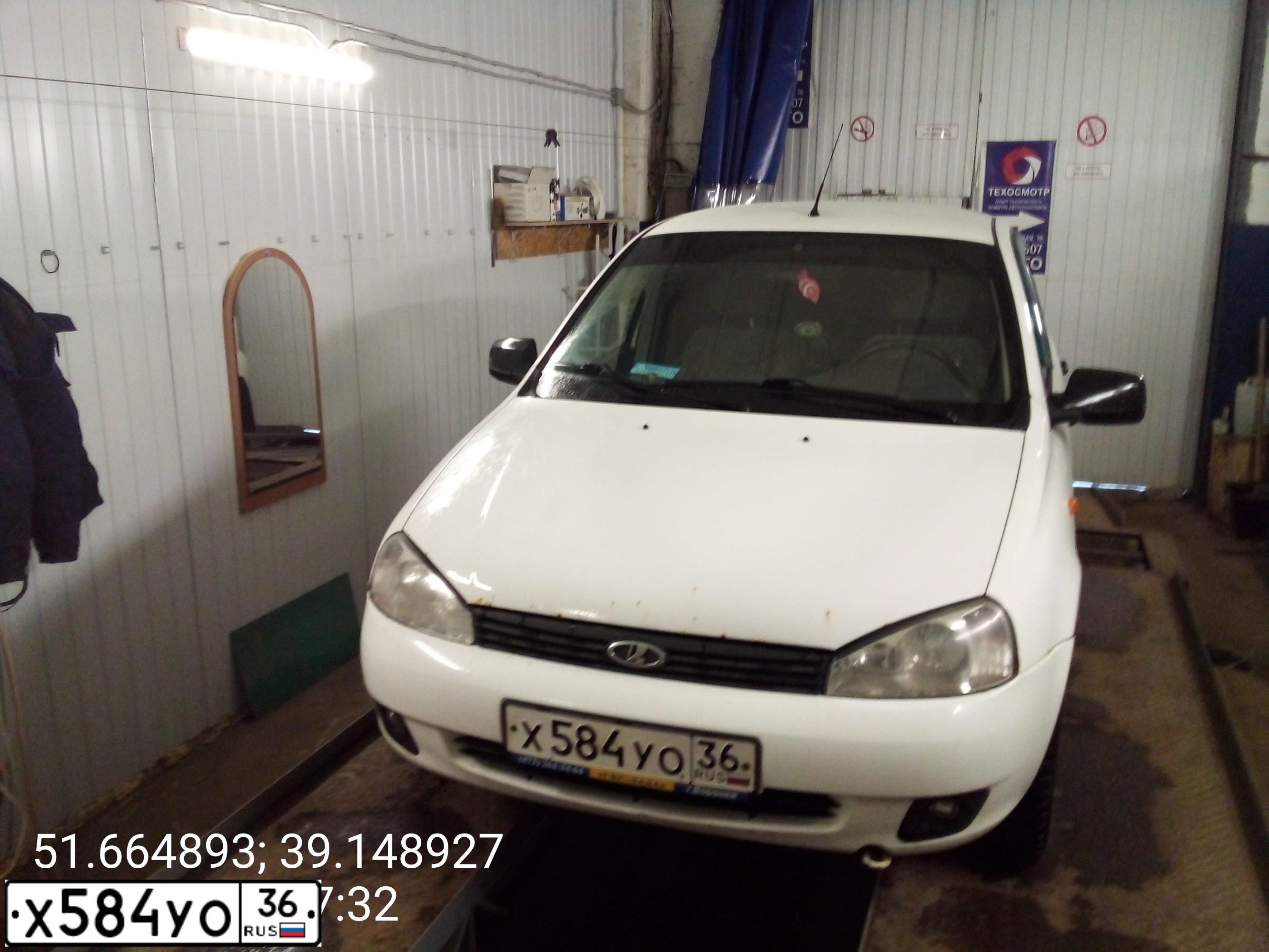 Фото автомобиля LADA 1119 KALINA, 2012 — госномер Х584УО36. Цвет: БЕЛЫЙ