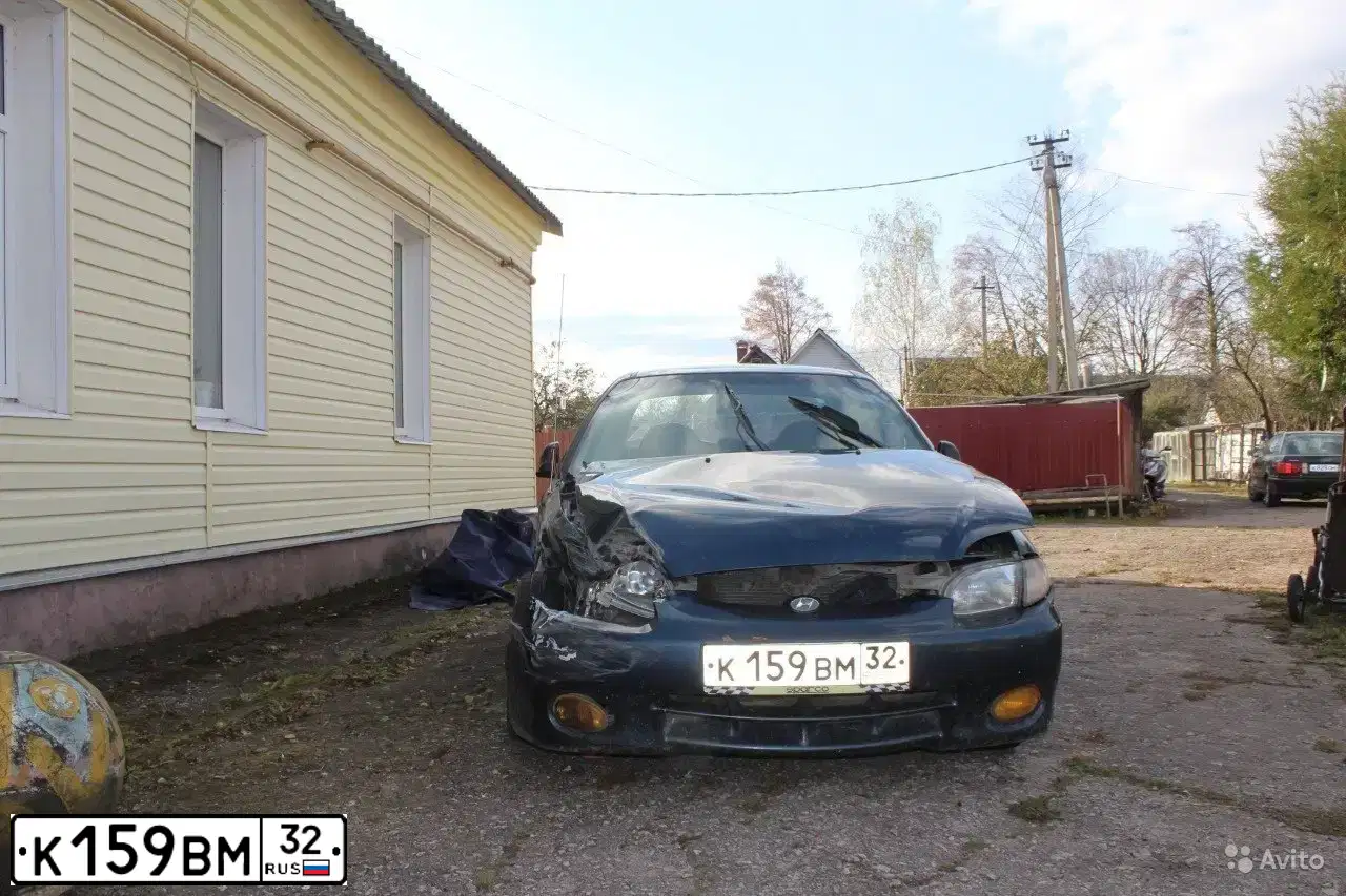 Фото автомобиля LADA 2110, 1998 — госномер К189ВМ32. Цвет: Красный