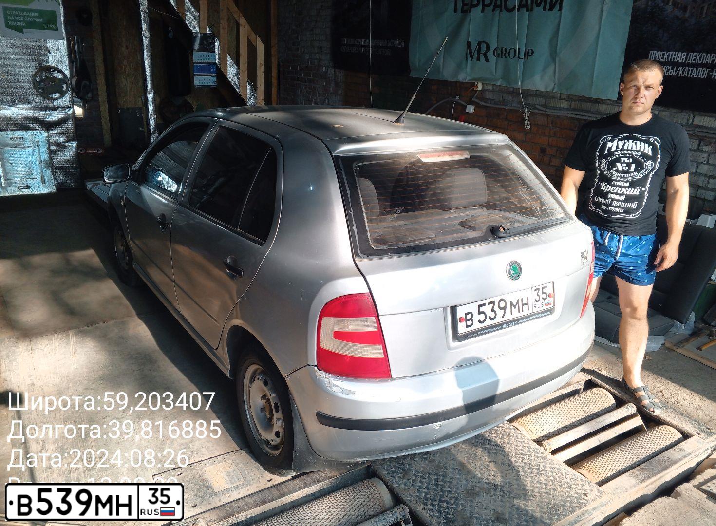 Фото автомобиля SKODA FABIA, 2005 — госномер М521НС35. Цвет: Серебристый