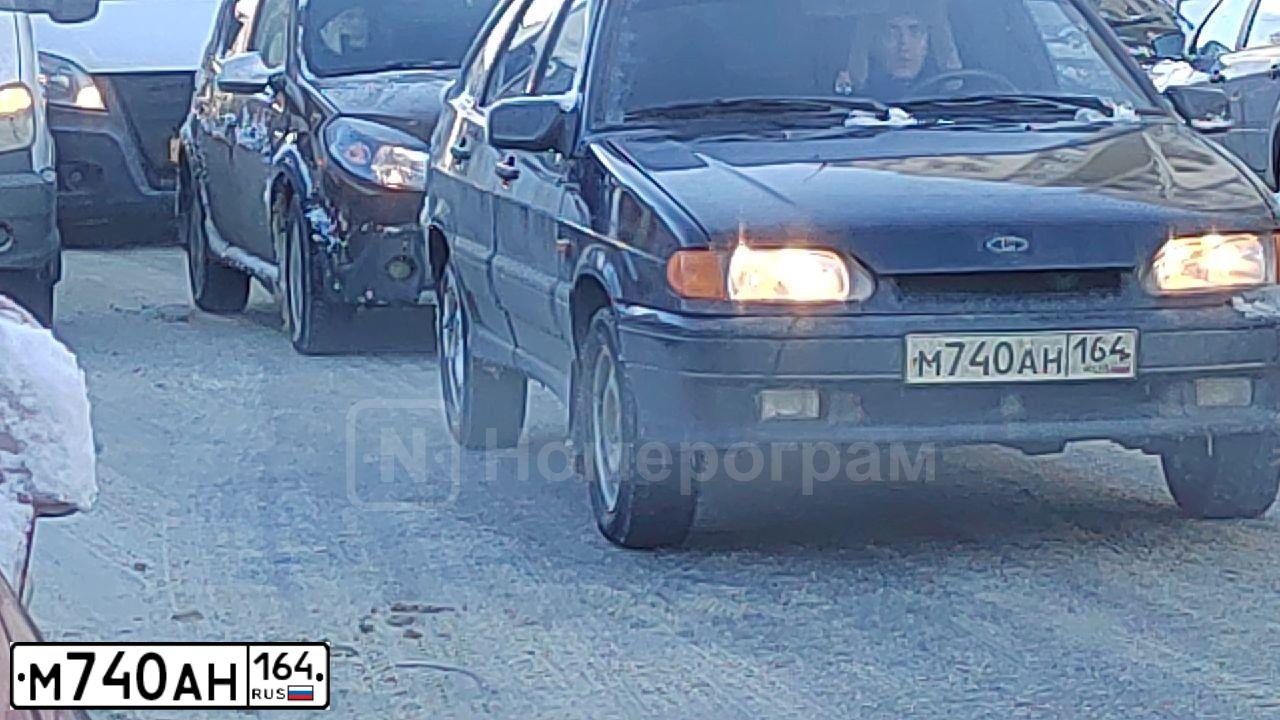 Фото автомобиля LADA 2114 SAMARA, 2004 — госномер У201ТК64. Цвет: ЧЕРНЫЙ