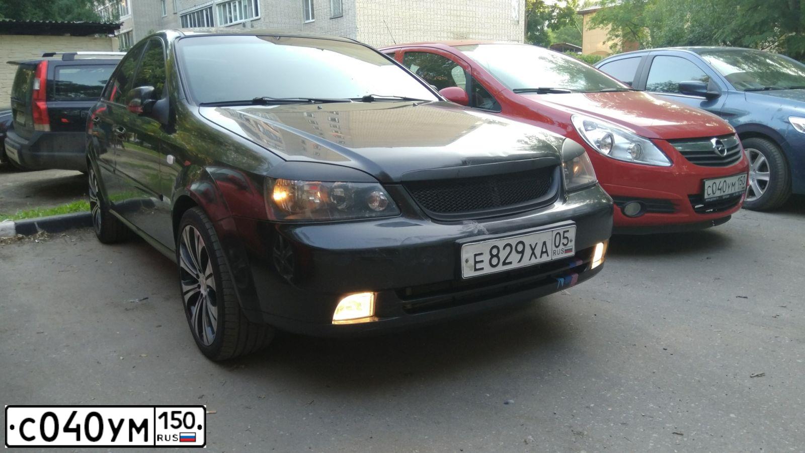 Фото автомобиля OPEL CORSA, 2008 — госномер С040УМ150. Цвет: КРАСНЫЙ