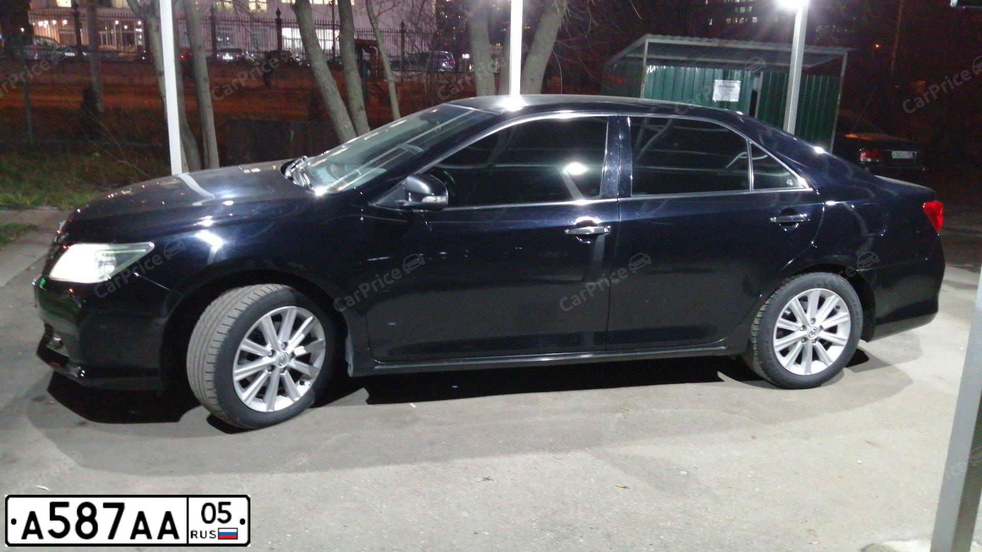 Фото автомобиля TOYOTA CAMRY, 2013 — госномер А587АА05. Цвет: ЧЕРНЫЙ МЕТАЛЛИК