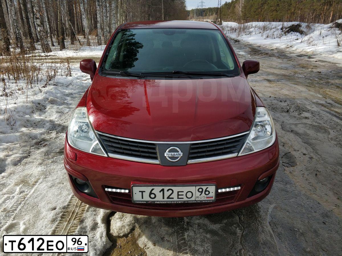 Фото автомобиля NISSAN TIIDA, 2007 — госномер В699РН89. Цвет: Красный