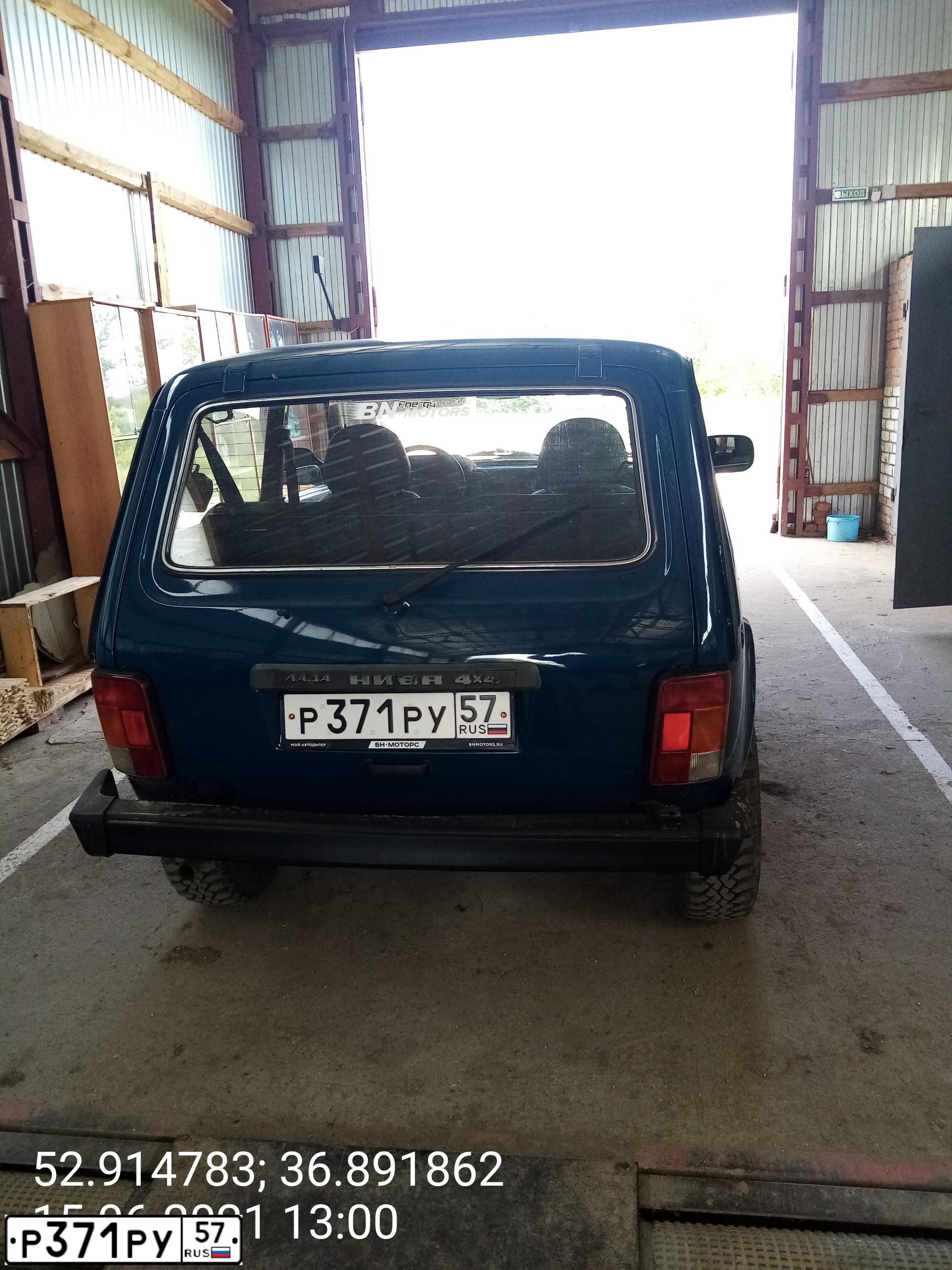 Фото автомобиля LADA 2121 NIVA, 2011 — госномер А431ХО57. Цвет: сине-зеленый