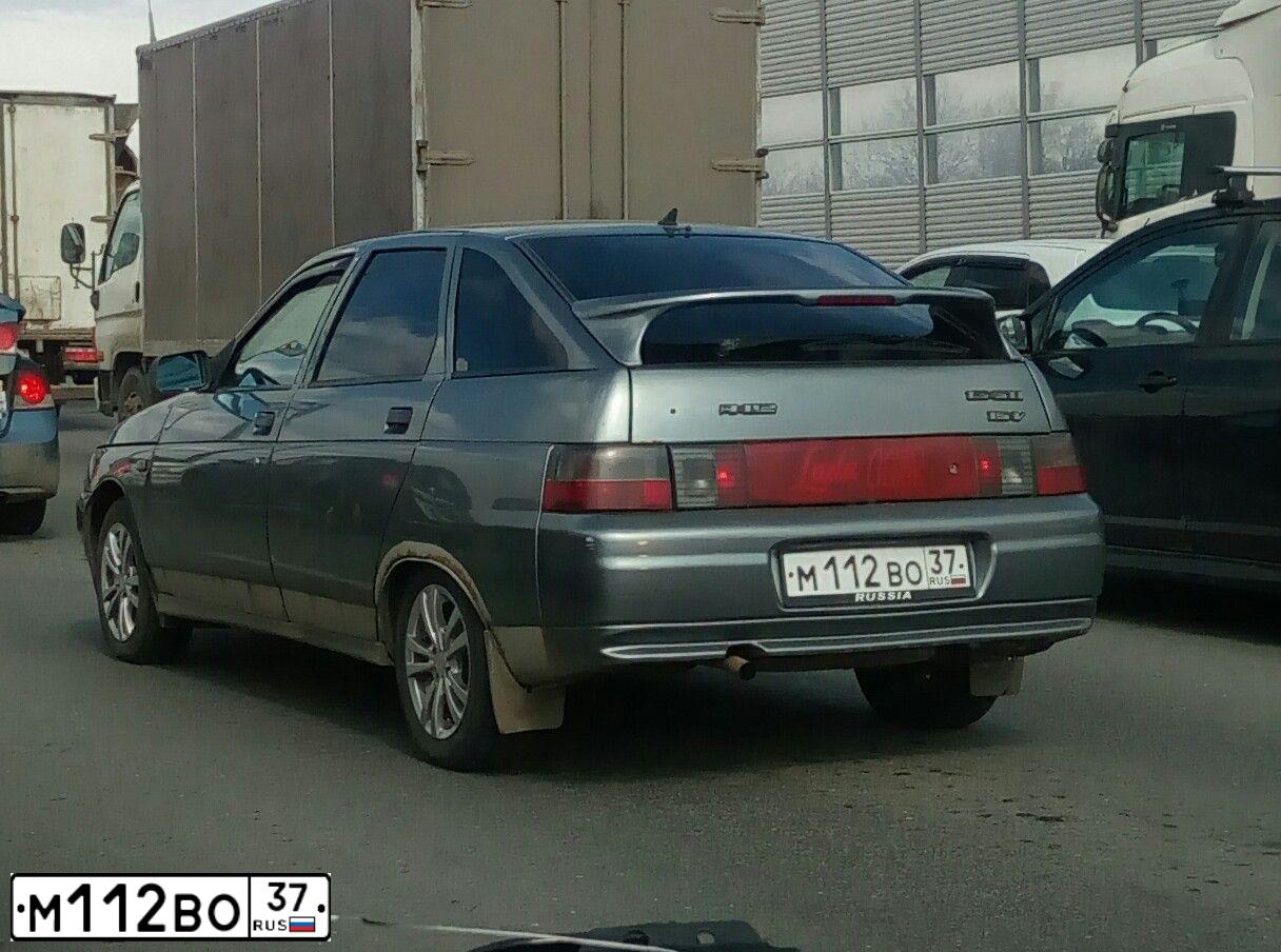 Фото автомобиля LADA 2112 LADA, 2004 — госномер О312АА29. Цвет: СЕРО-ЗЕЛЕНЫЙ