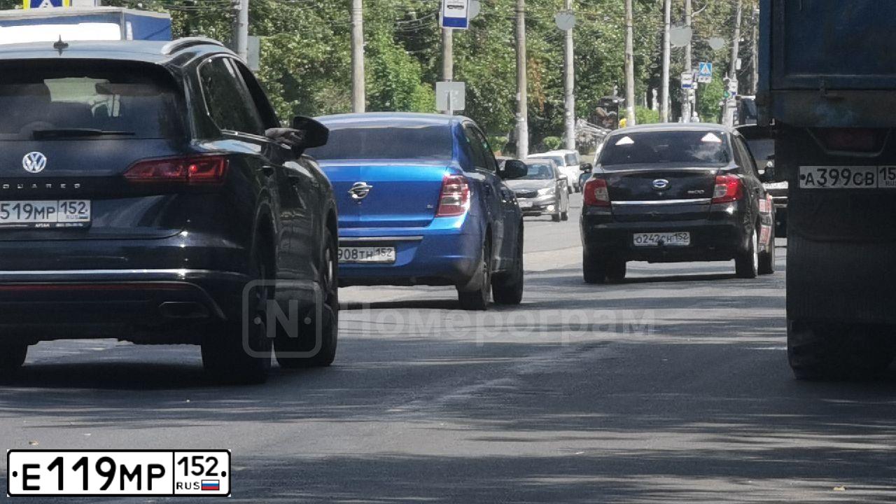 Фото автомобиля FORD FOCUS, 2007 — госномер Е119МР152. Цвет: СВЕТЛО-СЕРЫЙ