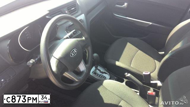 Фото автомобиля KIA RIO, 2012 — госномер С873РМ34. Цвет: Белый