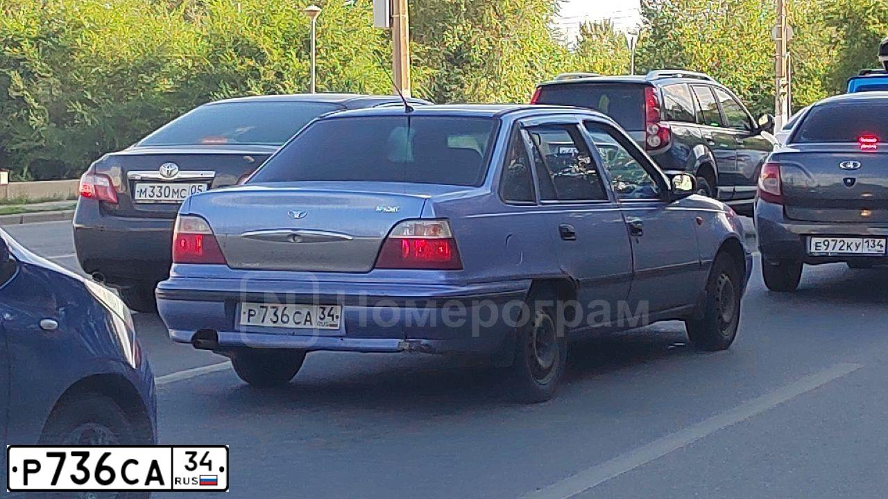 Фото автомобиля DAEWOO NEXIA, 2008 — госномер Р736СА34. Цвет: ВАСИЛЕК