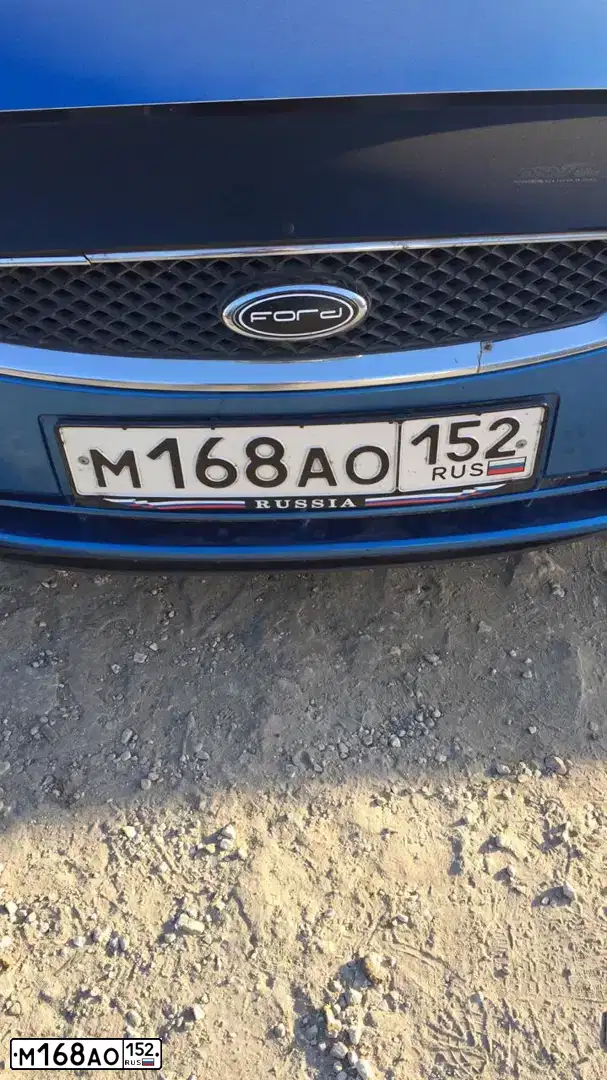 Фото автомобиля FORD D FOCUS, 2006 — госномер Т538ТМ33. Цвет: голубой