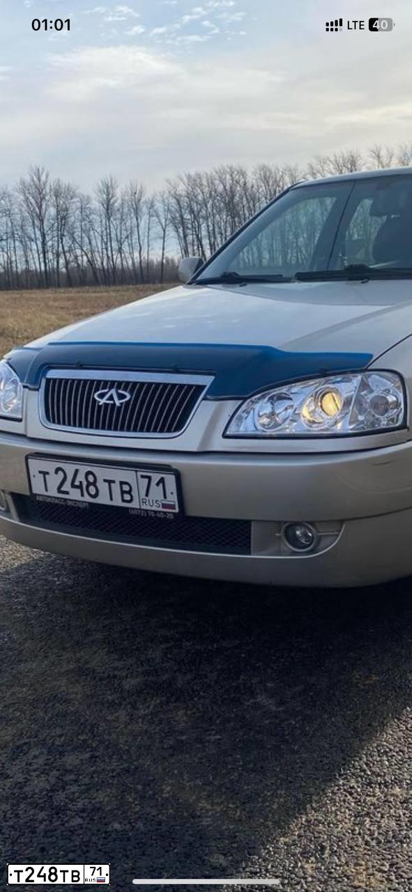 Фото автомобиля CHERY AMULET FLAGCLOUD, 2007 — госномер Т248ТВ71. Цвет: СЕРЫЙ