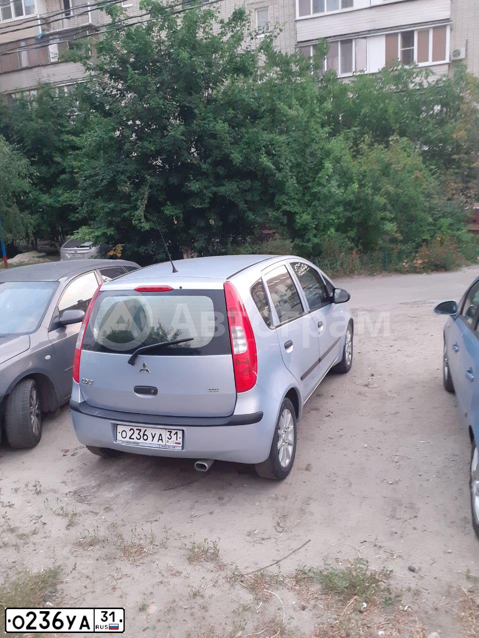 Фото автомобиля MITSUBISHI COLT, 2005 — госномер О236УА31. Цвет: СВЕТЛО-ГОЛУБОЙ