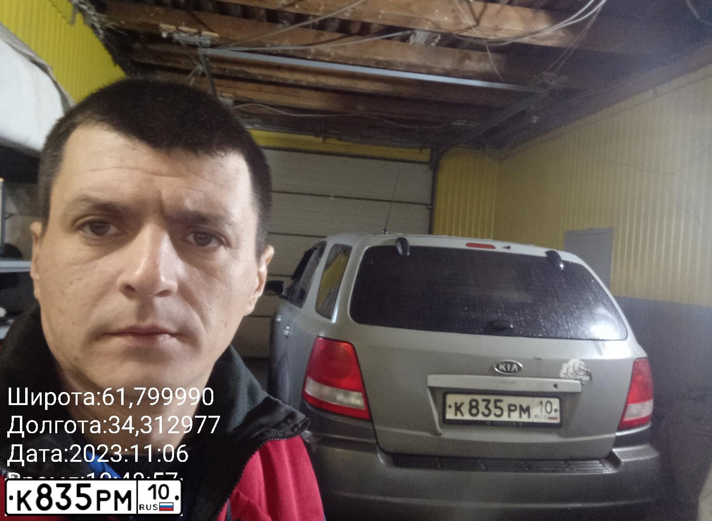 Фото автомобиля KIA SORENTO, 2002 — госномер К835РМ10. Цвет: ТЕМНО-СЕРЫЙ