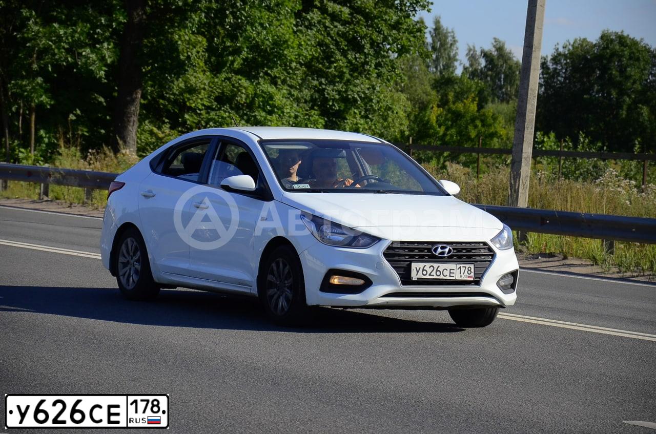 Фото автомобиля HYUNDAI SOLARIS, 2019 — госномер С065МУ07. Цвет: Белый