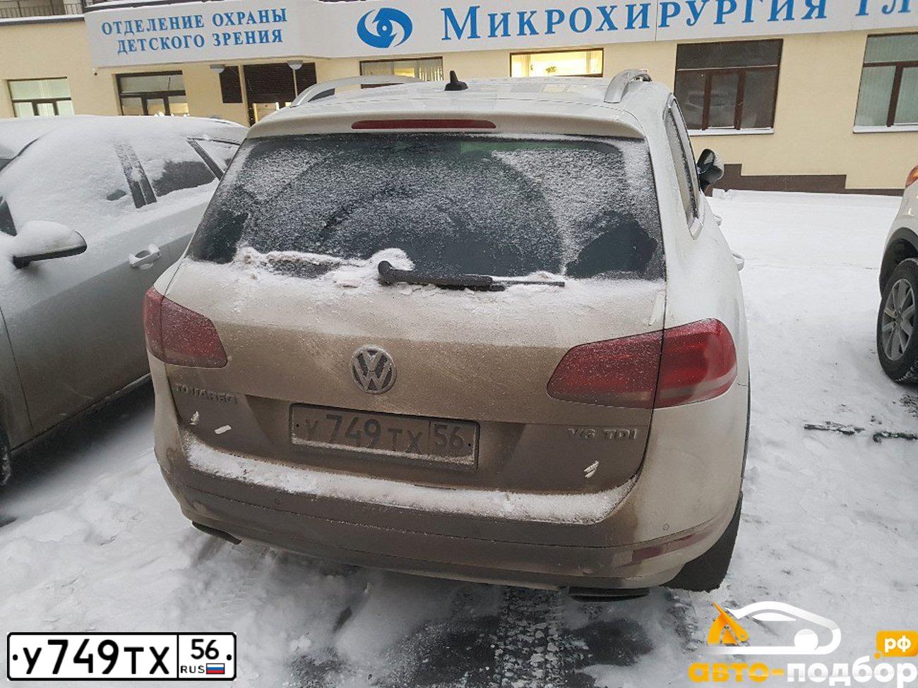 Фото автомобиля VOLKSWAGEN TOUAREG, 2012 — госномер А206ВВ774. Цвет: Белый