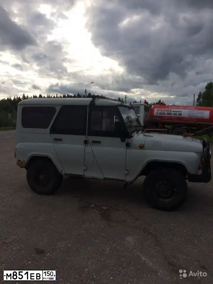 Фото автомобиля UAZ Z 3151  HUNTER, 2004 — госномер М851ЕВ150. Цвет: Белый
