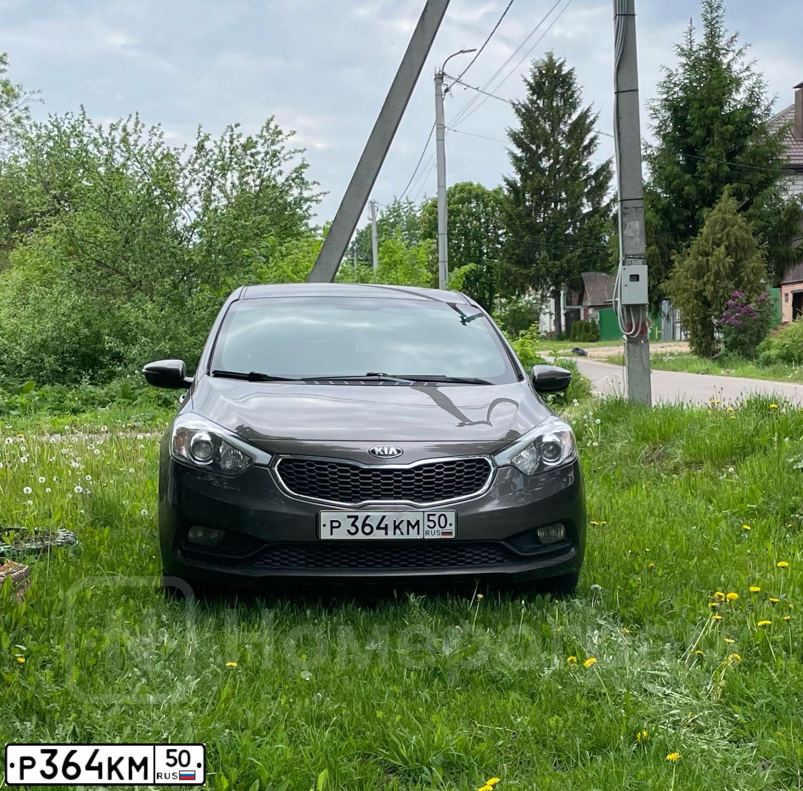 Фото автомобиля FORD ESCORT, 1996 — госномер Р364КМ50. Цвет: ВИШНЕВЫЙ