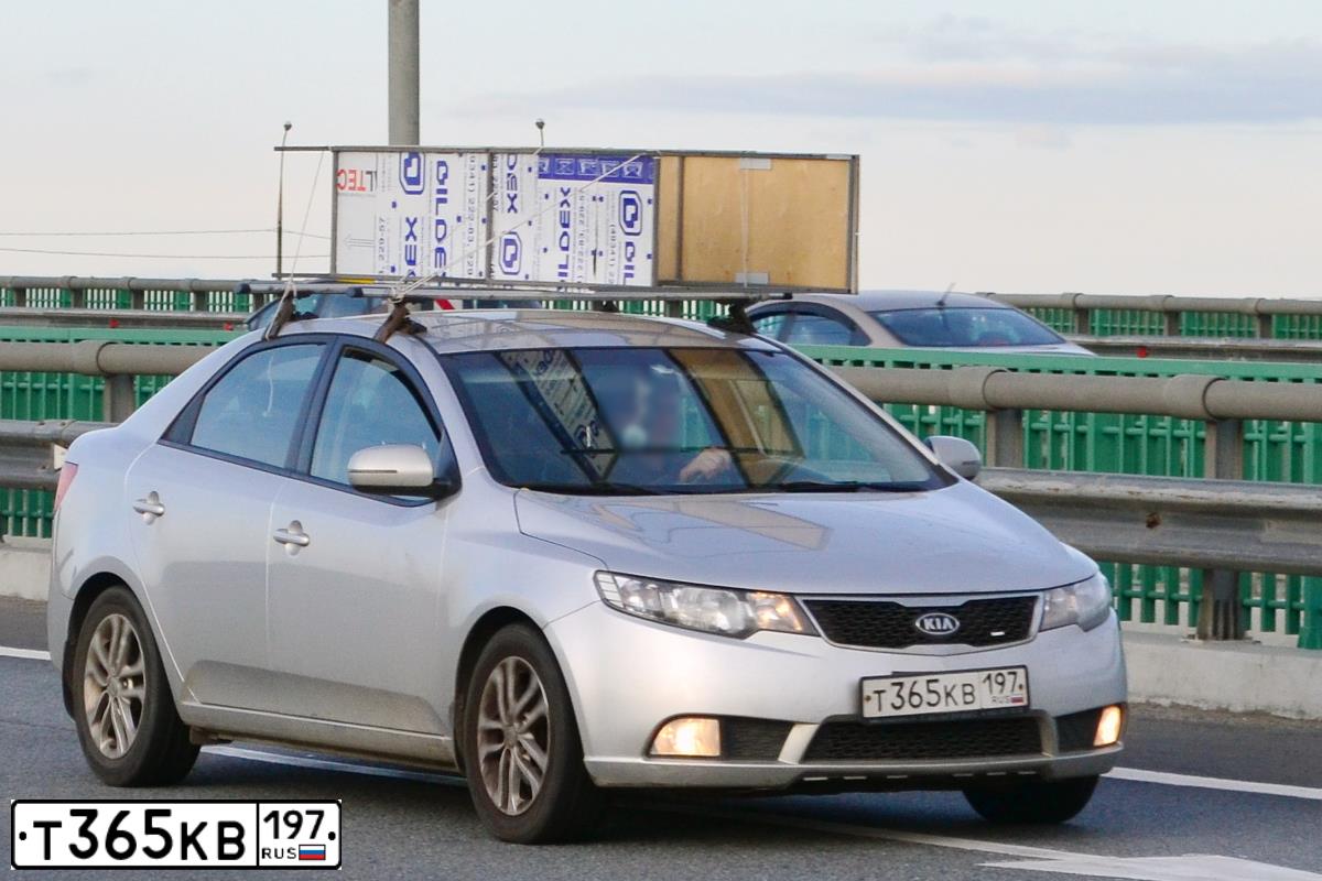 Фото автомобиля KIA CERATO, 2010 — госномер О554АК977. Цвет: СЕРЫЙ