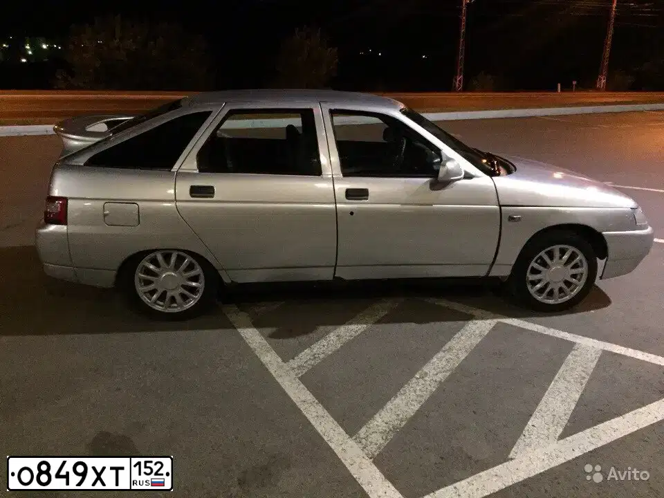Фото автомобиля LADA 2112, 2003 — госномер Н303ТУ69. Цвет: СВЕТЛО-СЕРЫЙ