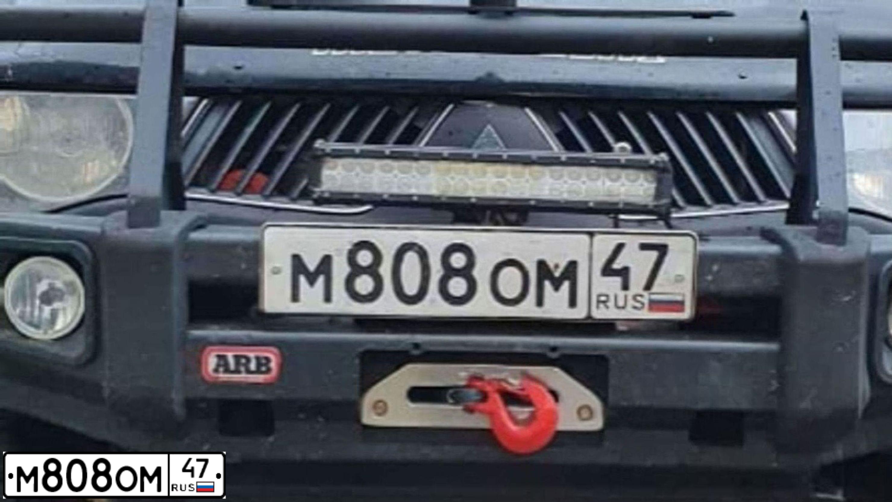 Фото автомобиля MITSUBISHI L 200, 2008 — госномер М808ОМ47. Цвет: ЧЕРНЫЙ