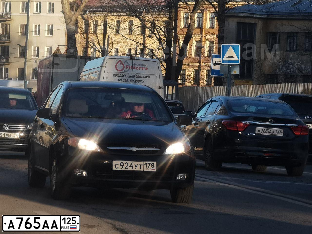 Фото автомобиля KIA QUORIS, 2013 — госномер С191КХ198. Цвет: ЧЕРНЫЙ
