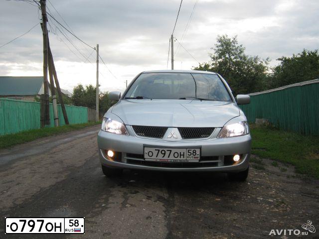 Фото автомобиля MITSUBISHI LANCER, 2004 — госномер Н074ЕХ134. Цвет: Серебристый