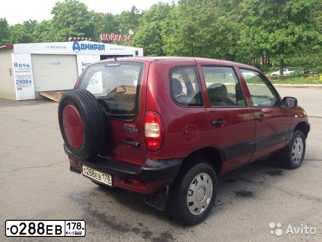 Фото автомобиля CHEVROLET NIVA, 2004 — госномер А386ОК147. Цвет: СЕРЕБРИСТЫЙ ЯРКО-КРАСНЫЙ