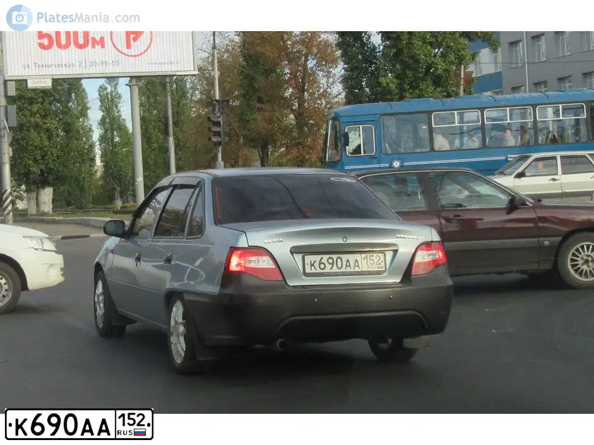 Фото автомобиля DAEWOO NEXIA, 2012 — госномер К690АА152. Цвет: СЕРО-ГОЛУБОЙ