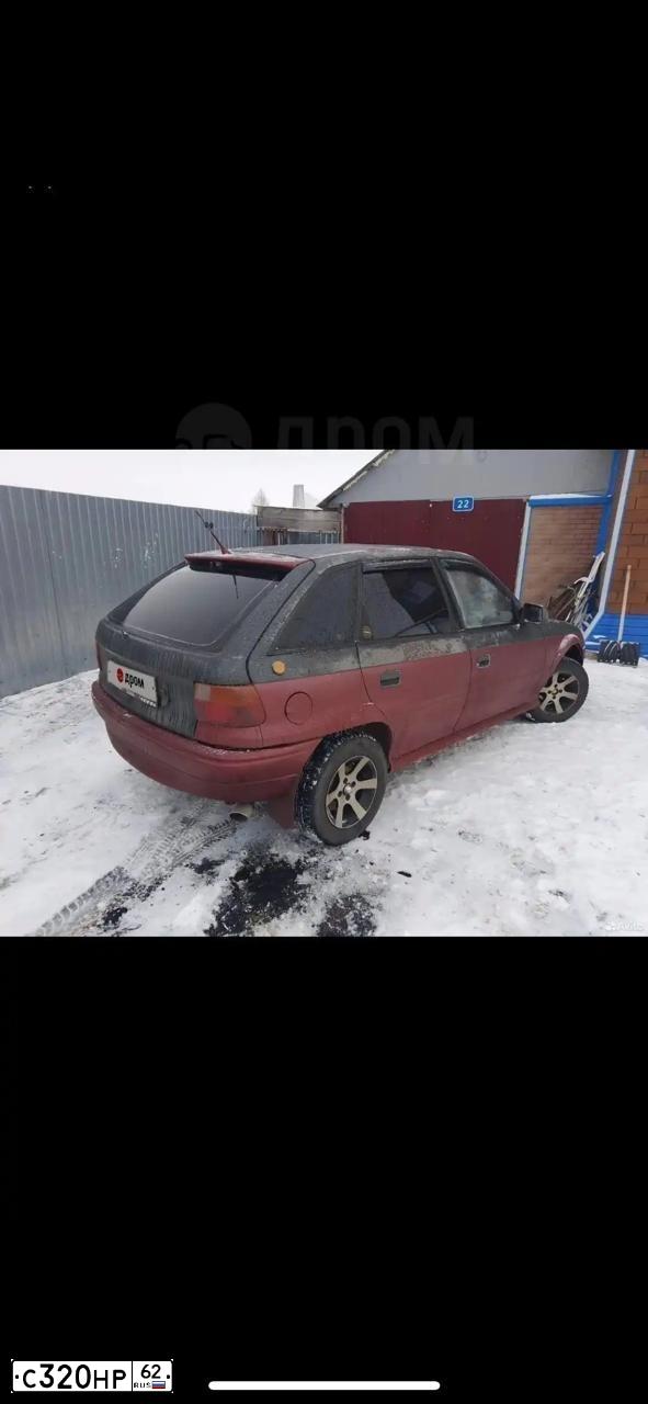 Фото автомобиля OPEL ASTRA, 1992 — госномер К975ТА62. Цвет: КРАСНЫЙ