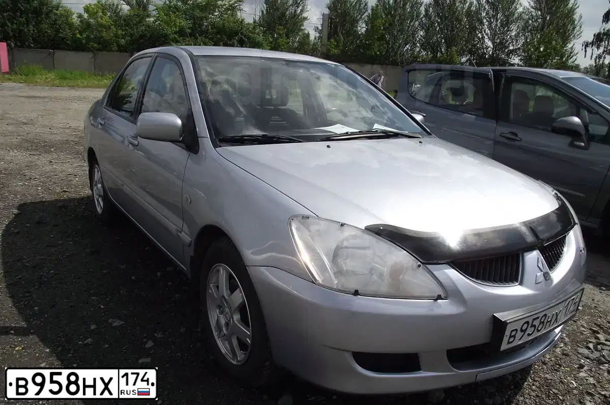 Фото автомобиля MITSUBISHI LANCER, 2005 — госномер О871УЕ750. Цвет: СЕРЕБРИСТЫЙ