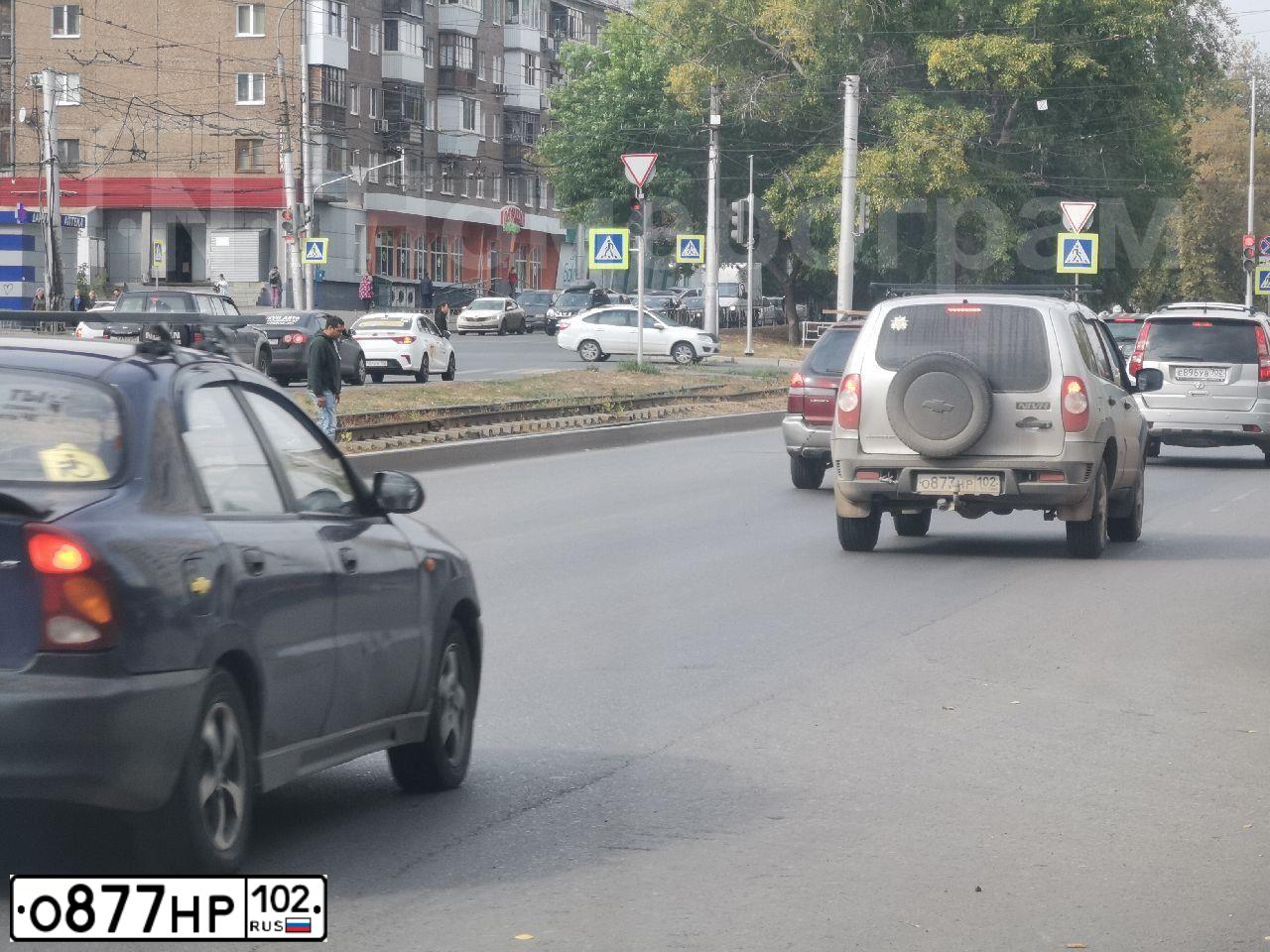 Фото автомобиля KIA SPORTAGE, 2006 — госномер О877НР102. Цвет: ЧЕРНЫЙ