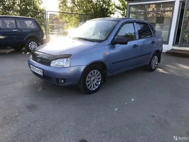 Фото автомобиля LADA 1118 KALINA, 2005 — госномер Е716ЕХ164. Цвет: СЕРО-СИНИЙ