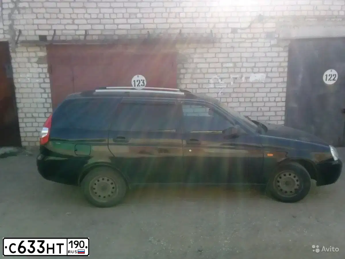 Фото автомобиля LADA 2171 PRIORA, 2009 — госномер С633НТ190. Цвет: Сине-Черный