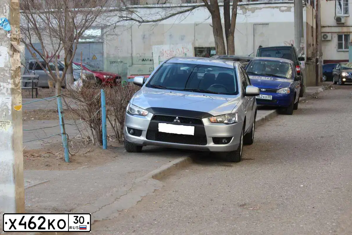 Фото автомобиля LADA 2112, 2007 — госномер Т884НМ30. Цвет: Светло-Серебристый металлик