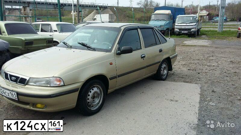 Фото автомобиля DAEWOO NEXIA, 2005 — госномер К124СХ161. Цвет: ПЕСОЧНЫЙ