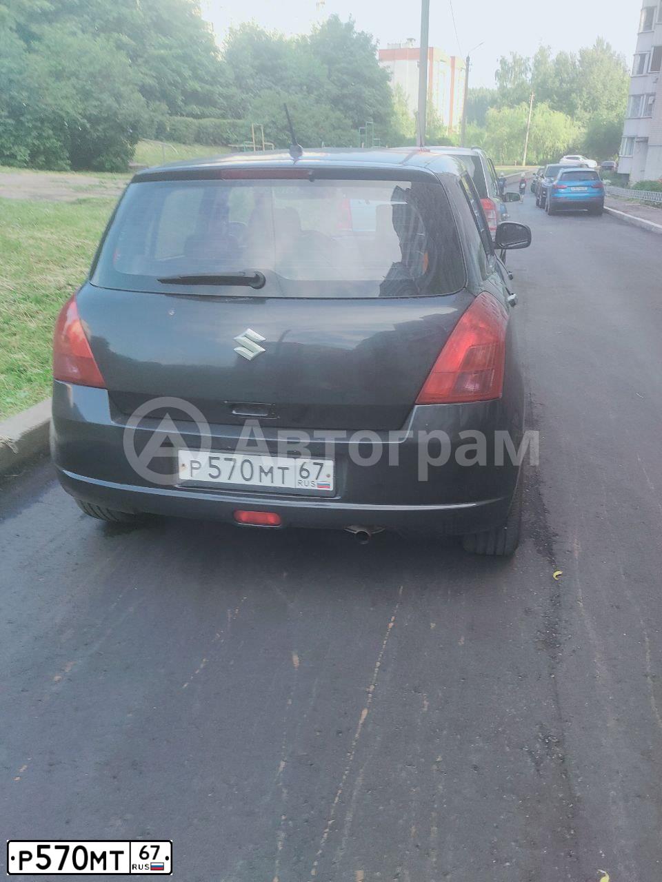 Фото автомобиля SUZUKI SWIFT, 2007 — госномер Р570МТ67. Цвет: ЧЕРНЫЙ