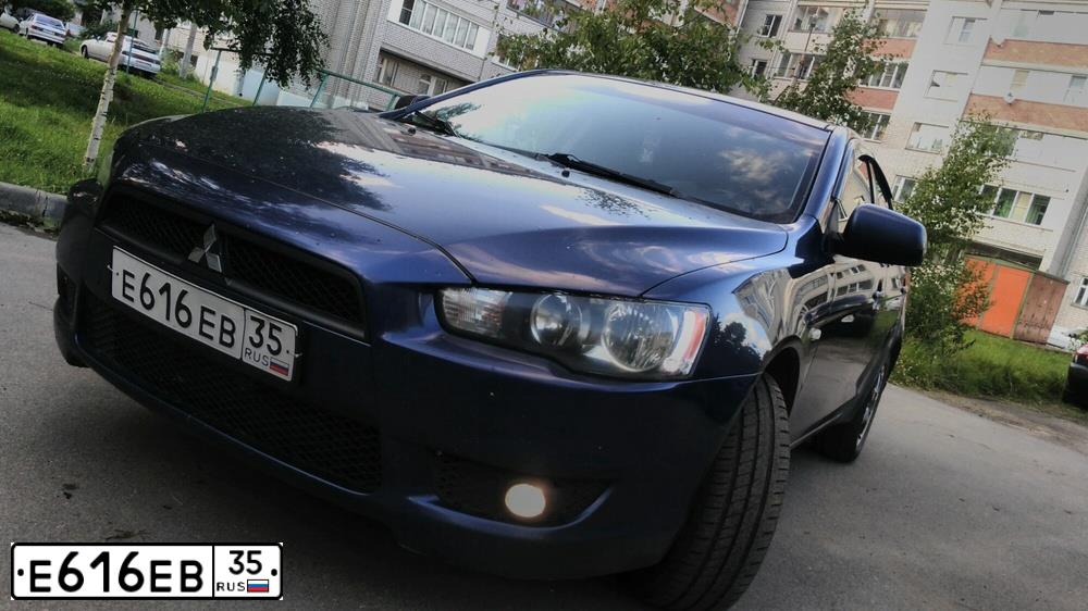 Фото автомобиля MITSUBISHI LANCER, 2007 — госномер В423ТУ37. Цвет: ТЕМНО-СИНИЙ