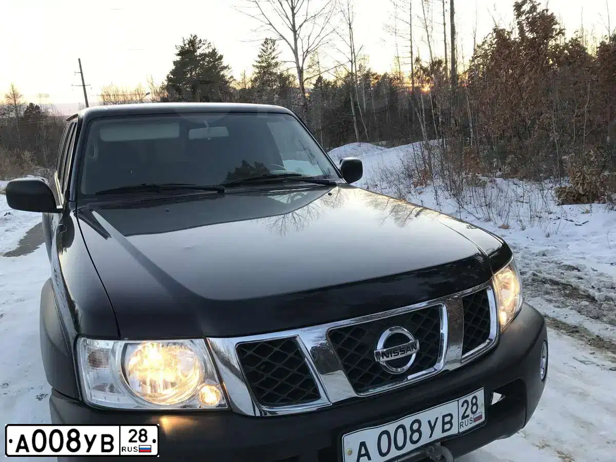 Фото автомобиля NISSAN PATROL, 2011 — госномер Т958МТ125. Цвет: ЧЕРНЫЙ