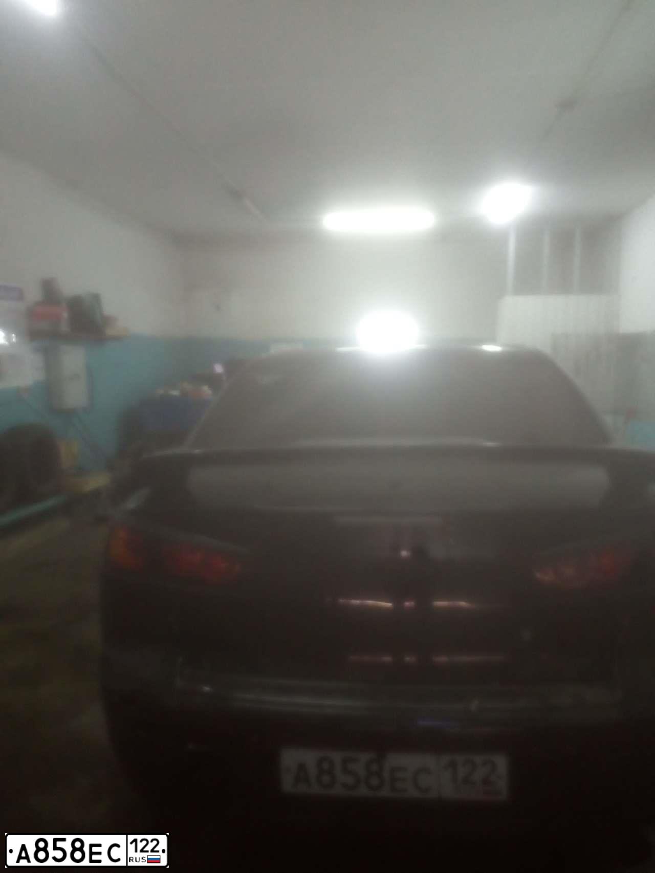Фото автомобиля MITSUBISHI LANCER, 2007 — госномер О094ВА04. Цвет: ЧЕРНЫЙ