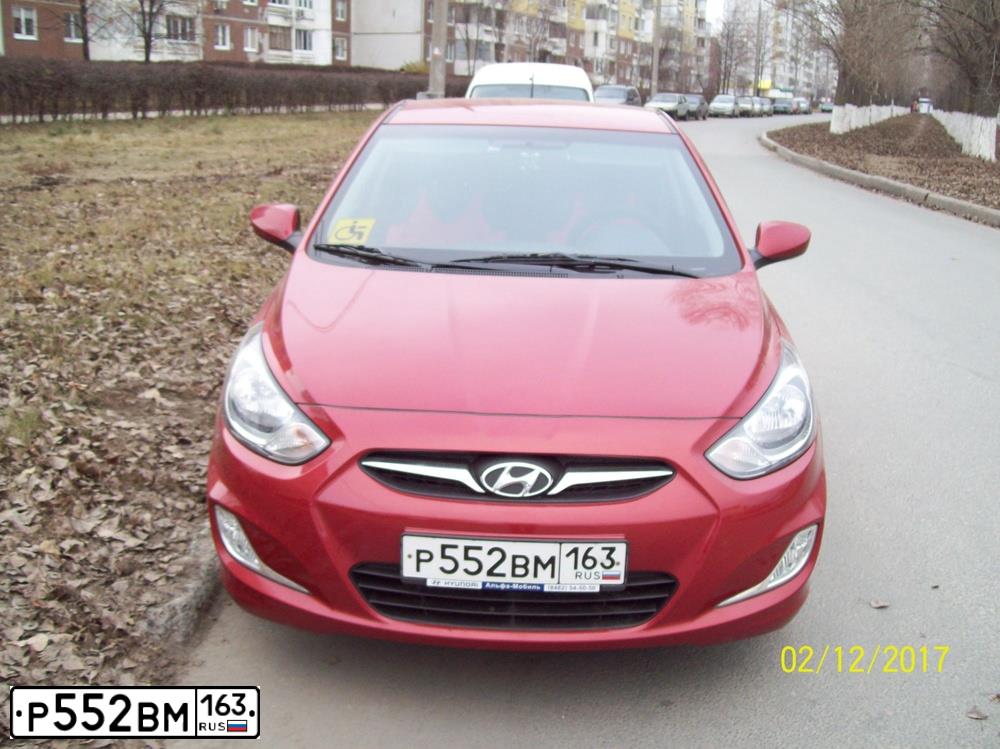 Фото автомобиля HYUNDAI SOLARIS, 2012 — госномер Р552ВМ163. Цвет: КРАСНЫЙ ГРАНАТ