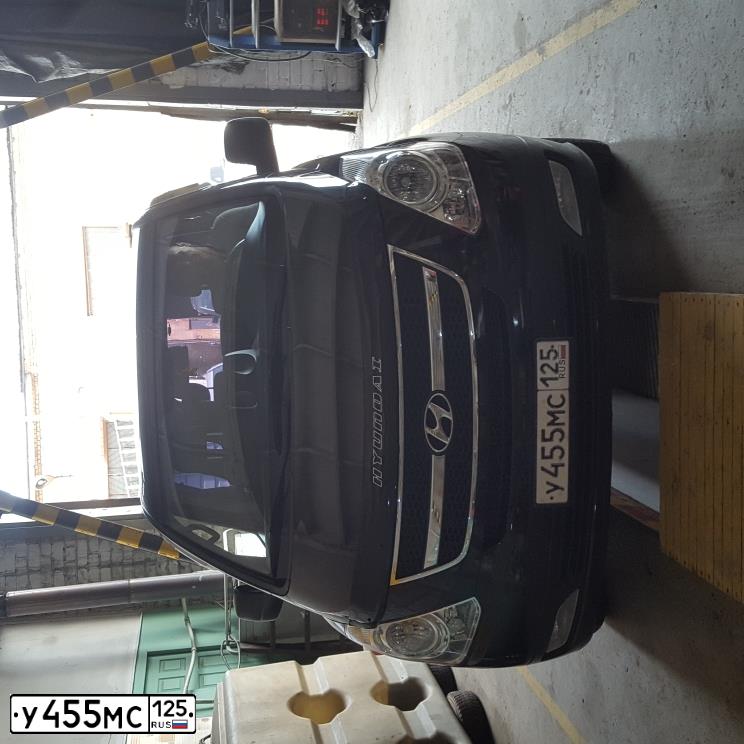 Фото автомобиля HYUNDAI GRAND STAREX, 2015 — госномер У455МС125. Цвет: ЧЕРНЫЙ
