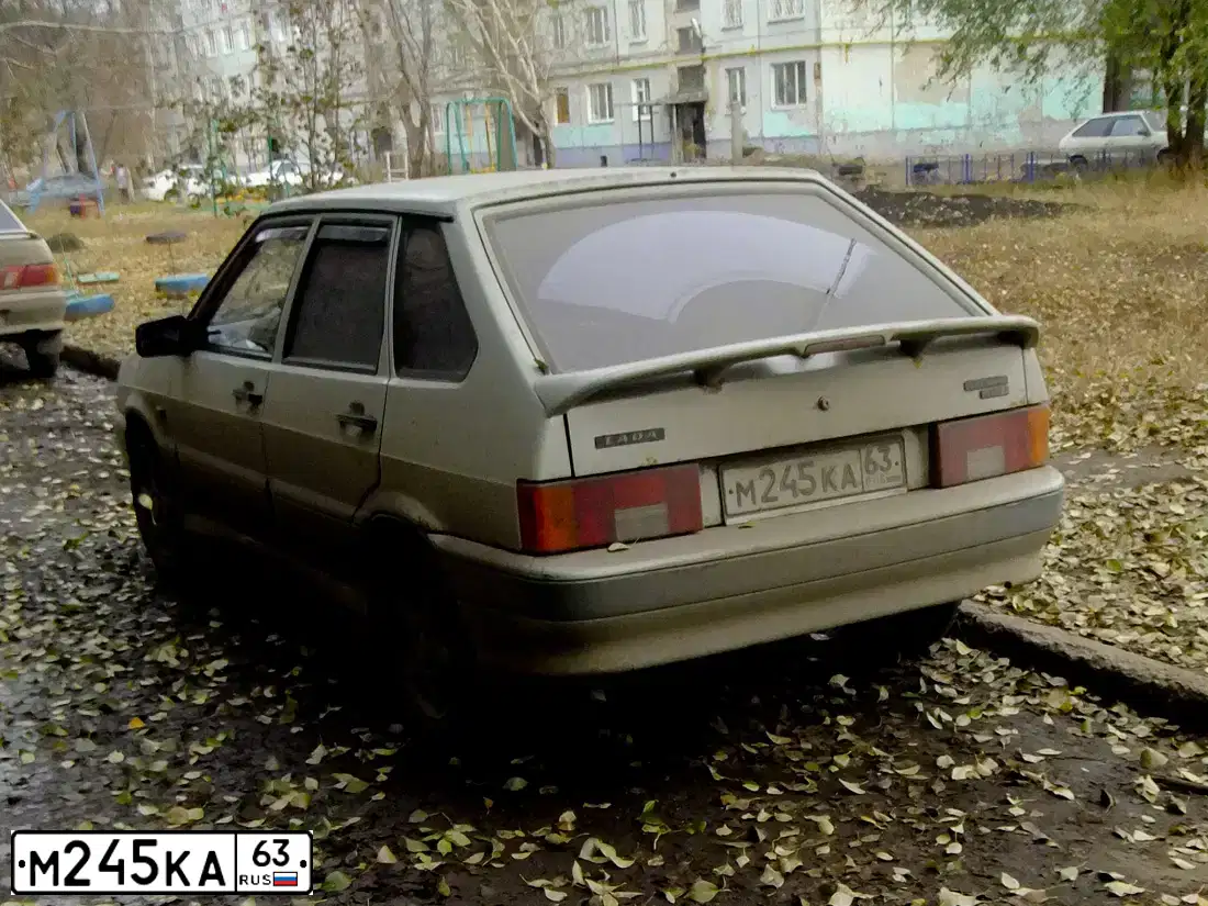 Фото автомобиля LADA 2114 SAMARA, 2005 — госномер Н299ХО73. Цвет: МОЛОЧНО-БЕЛЫЙ СЕРЕБРИСТЫЙ