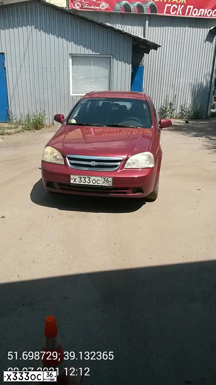 Фото автомобиля CHEVROLET LACETTI, 2006 — госномер У293МУ136
