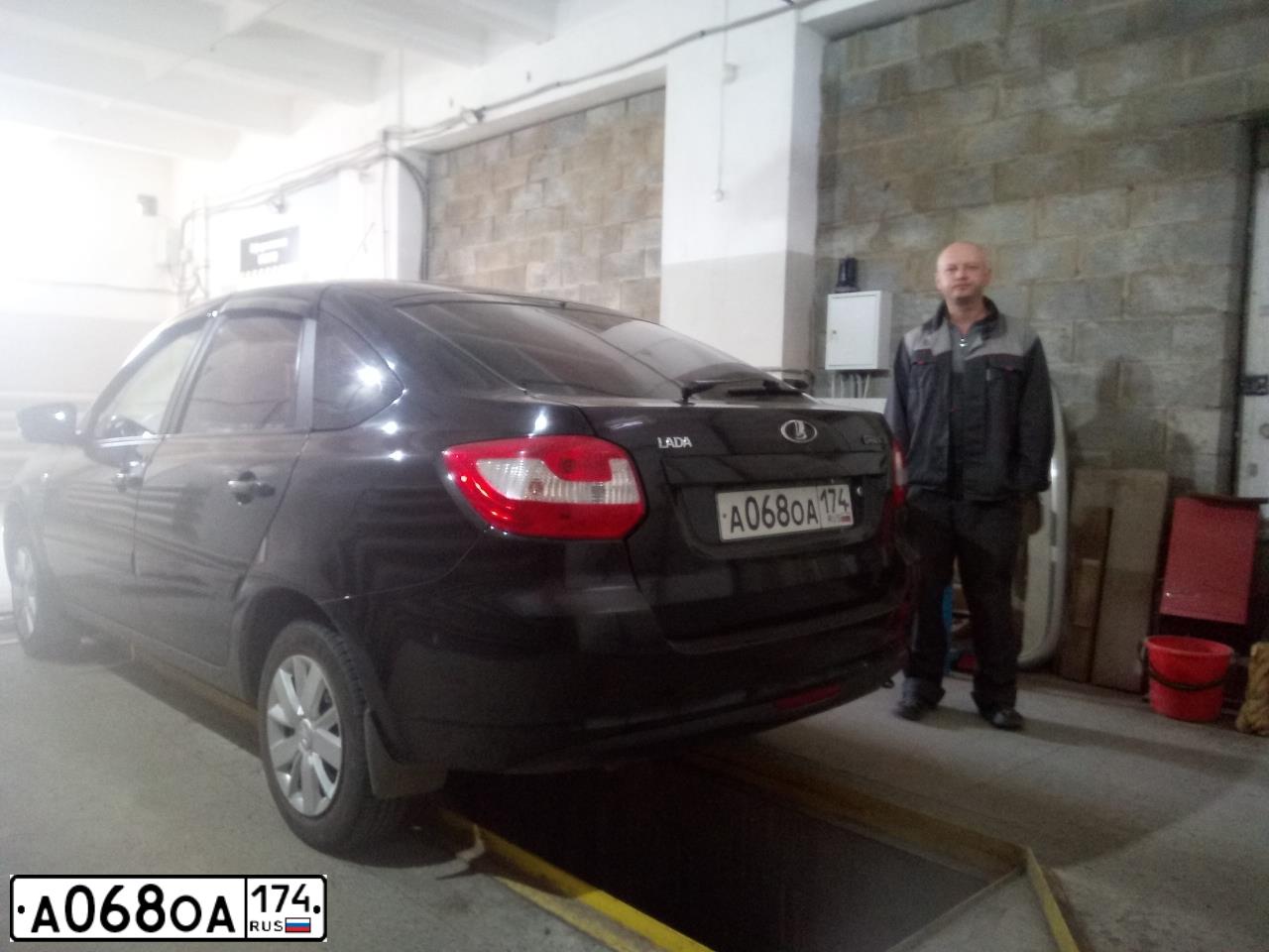 Фото автомобиля LADA 2191 GRANTA, 2014 — госномер А068ОА174. Цвет: ЧЕРНЫЙ