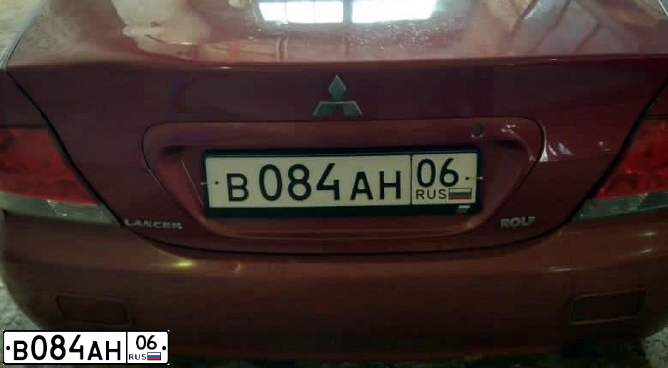 Фото автомобиля MITSUBISHI LANCER, 2005 — госномер О080МО44. Цвет: Красный
