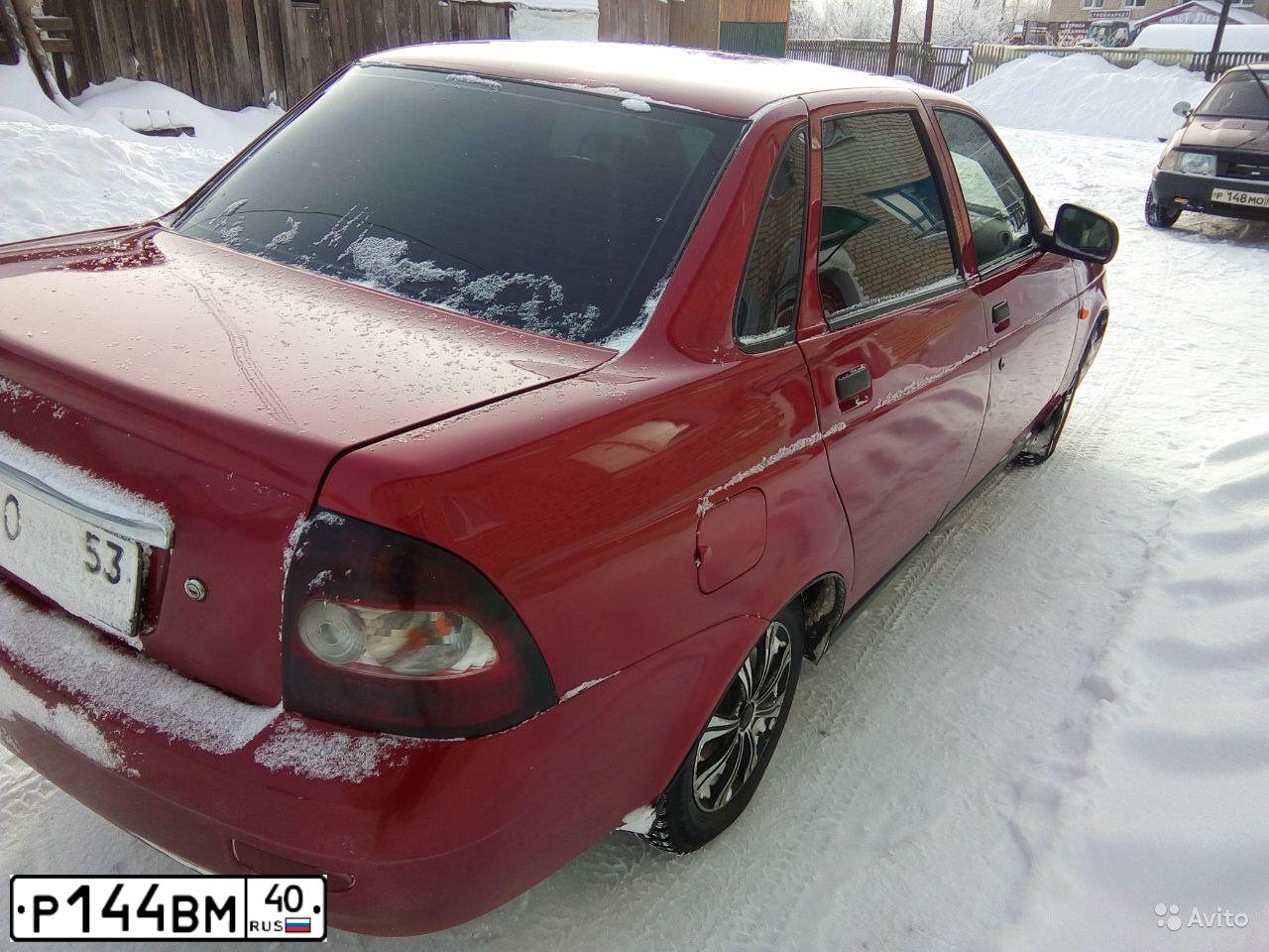 Фото автомобиля NISSAN MICRA, 2005 — госномер Р144ВМ40. Цвет: Красный