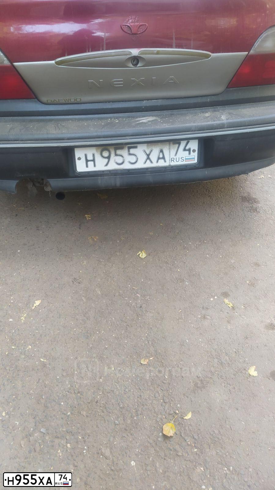Фото автомобиля DAEWOO NEXIA, 2006 — госномер Н955ХА74. Цвет: ИСПАНСКИЙ КРАСНЫЙ