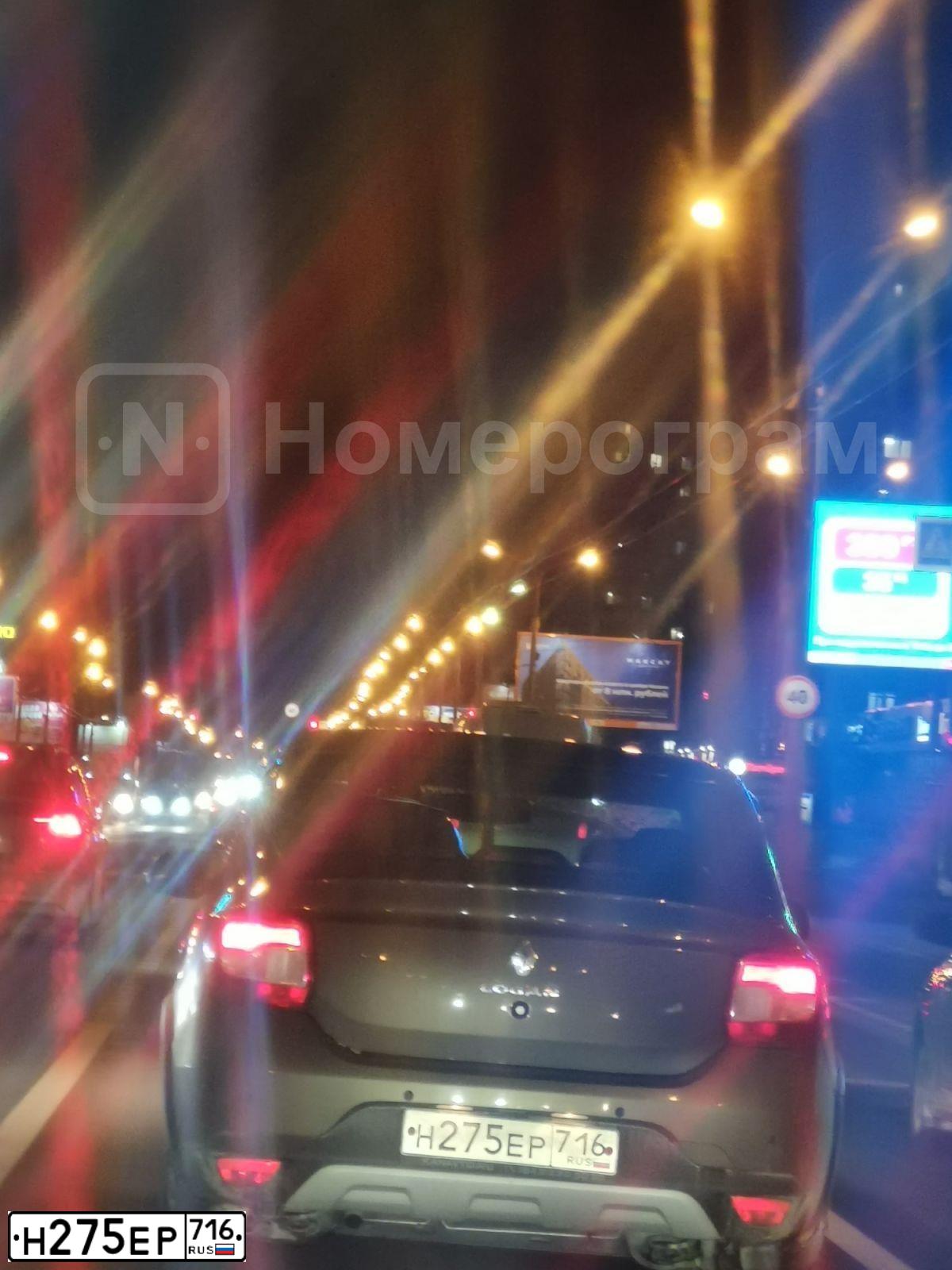 Фото автомобиля RENAULT LOGAN, 2020 — госномер Н275ЕР716. Цвет: Коричневый
