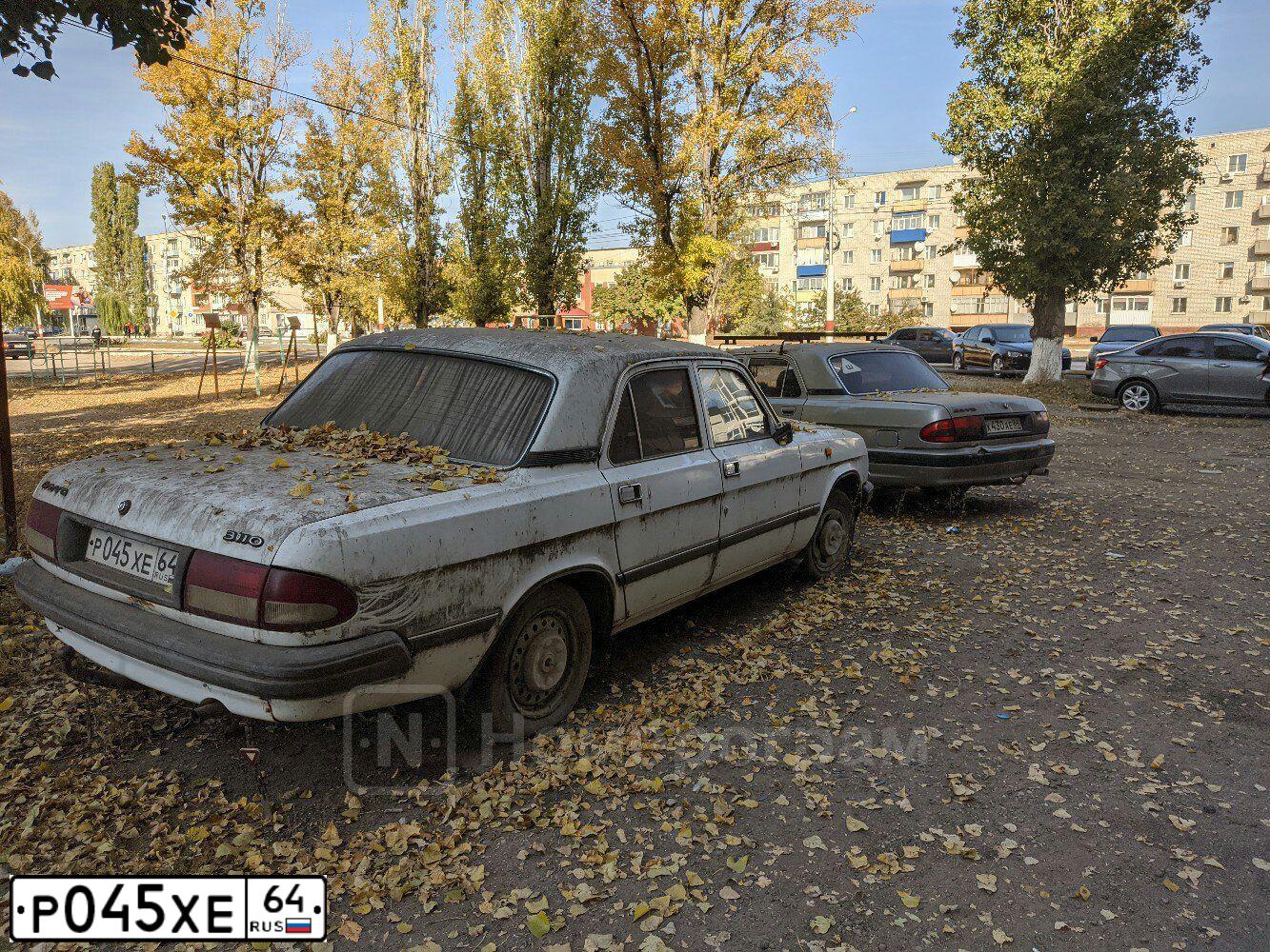 Фото автомобиля GAZ 3110 WOLGA, 1999 — госномер Р045ХЕ64. Цвет: Белый
