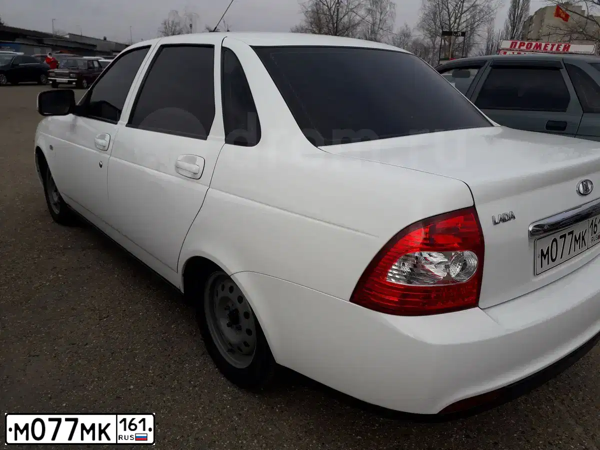 Фото автомобиля LADA 2172 PRIORA, 2010 — госномер К035УН161. Цвет: Сине-Черный